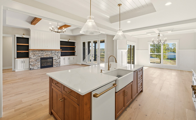 View of open layout, chef kitchen and living room